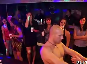 Drunk cheeks engulfing one-eyed monster in club
