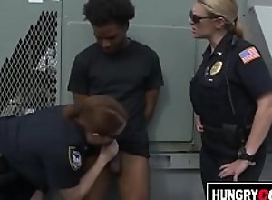 Black criminal is apprehended by two big titty