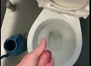 Wanking in public toilets with big cumshot at the