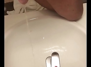 Piss in sink