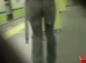 pee jeans at a station
