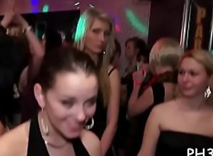 Drunk cheeks engulfing penis in club