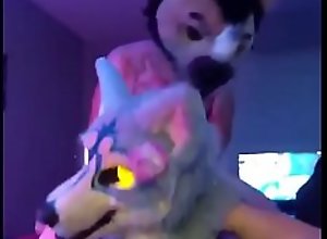 Fursuiter gets fucked in a room full of people