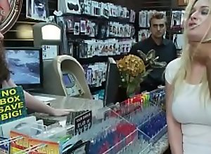 Busty blonde anal fucked in sex shop