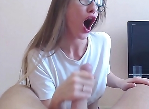 Hot teen with X glasses gives a thorough blowjob
