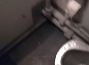 man masturbatet in the toilet of the train