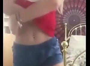 young beautiful girl undressing on camera - Full