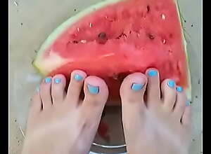 cute feet smashing watermelon