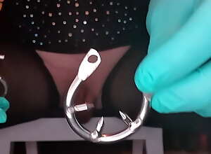 Sissy Veronica putting on Spiked Chastity Device