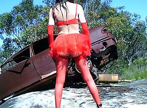 Risky outdoor crossdressing in red lingerie