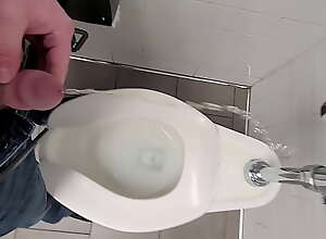 Inappropriately peeing all over a public toilet in