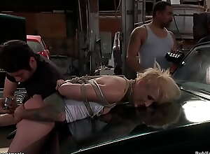 Bound blond ass fucked in repair shop