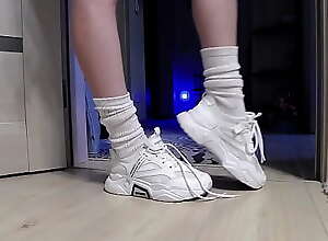 Delicate legs in sneakers are waiting for you!