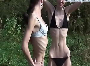 Very anorexic girls showing off in the woods 1