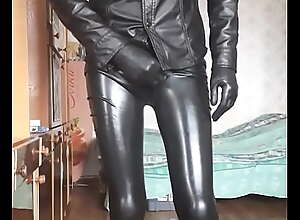 Guy in latex leggins and leather shirt