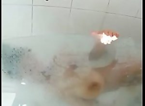 Huge tit teen taking a shower