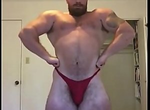 Beefy Bodybuilder Revealing Posing Trunks