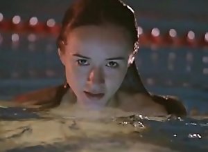 Petite teen hottie Vi Shy skinny dips in a pool